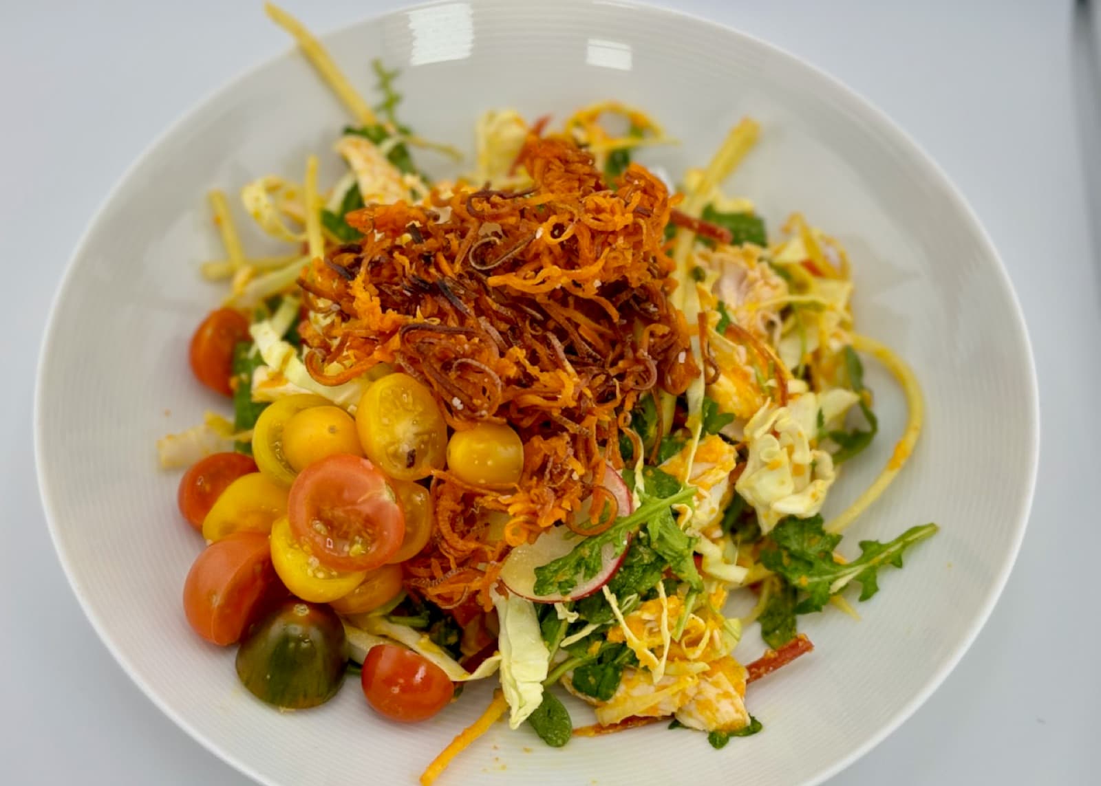Shredded chicken salad with carrot, ginger dressing