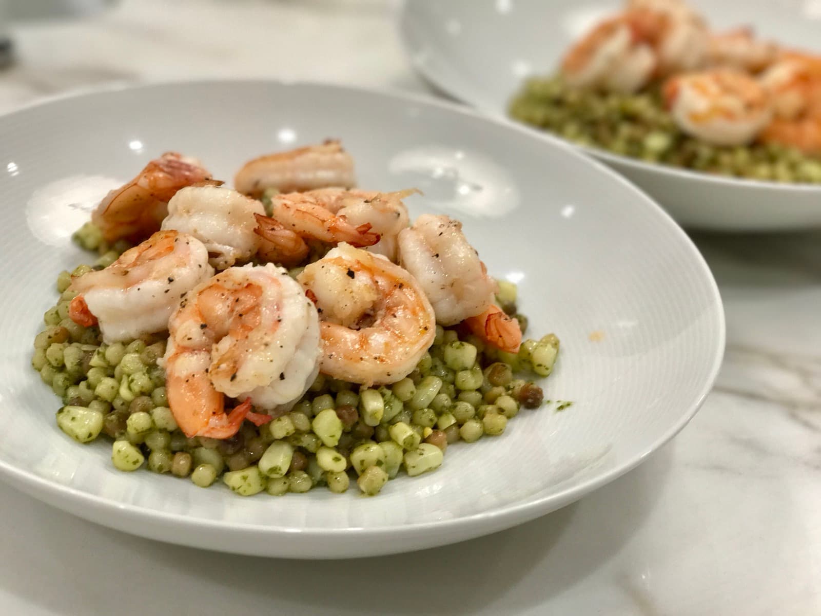 Shrimp with fregola sarda, corn, and pesto